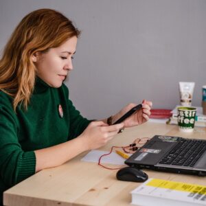 A women checks her blog post checklist before publishing