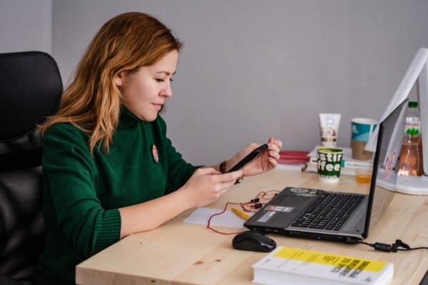 A women checks her blog post checklist before publishing